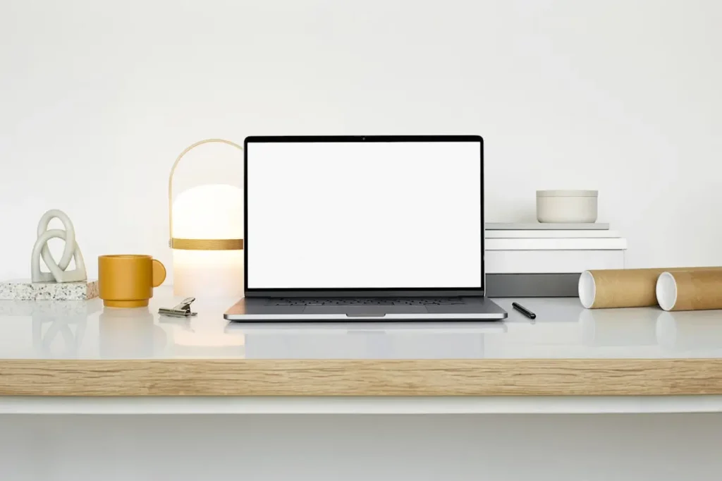 A clean bedside table with a minimalist smart lamp that integrates wireless charging