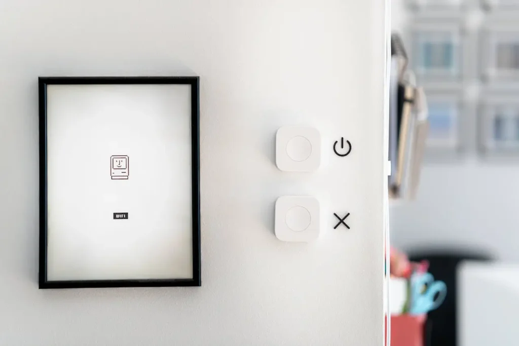 Integrated minimalist smart home panel blending into monochromatic smart home decor wall.